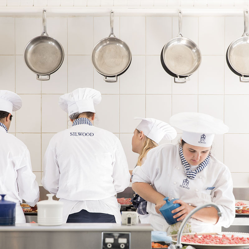 The-Silwood-School-of-Cookery-students-cooking-in-kitchen