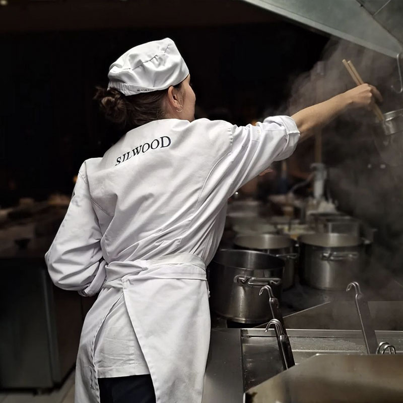 students cooking in kitchen at silwood school of cookery