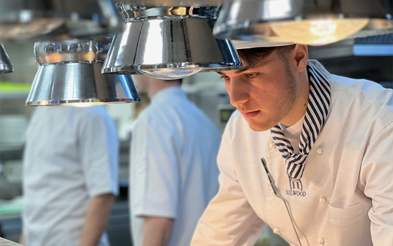 students cooking in kitchen at silwood school of cookery