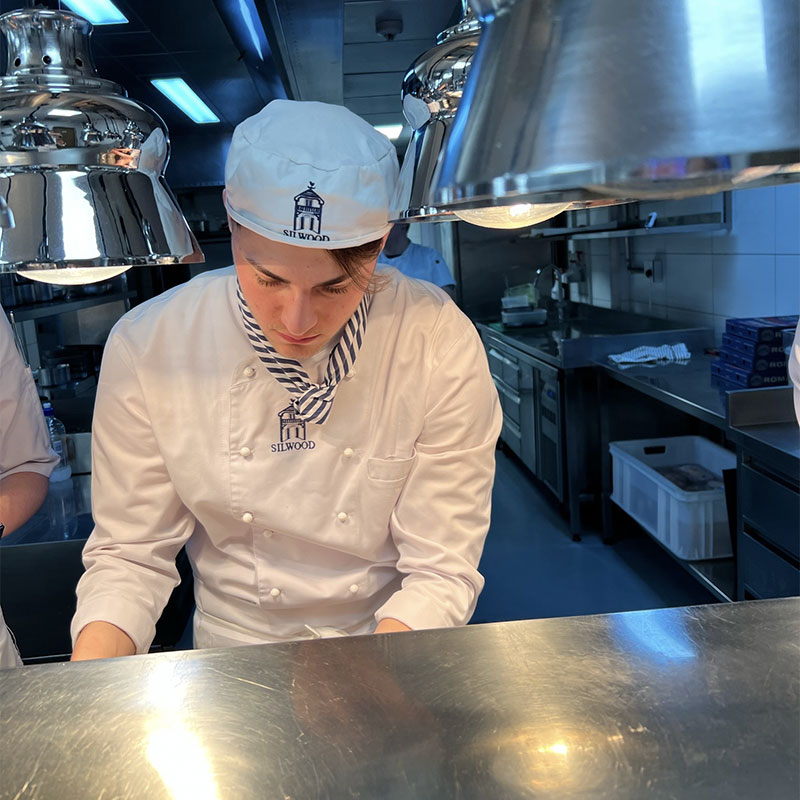 students cooking in kitchen at silwood school of cookery